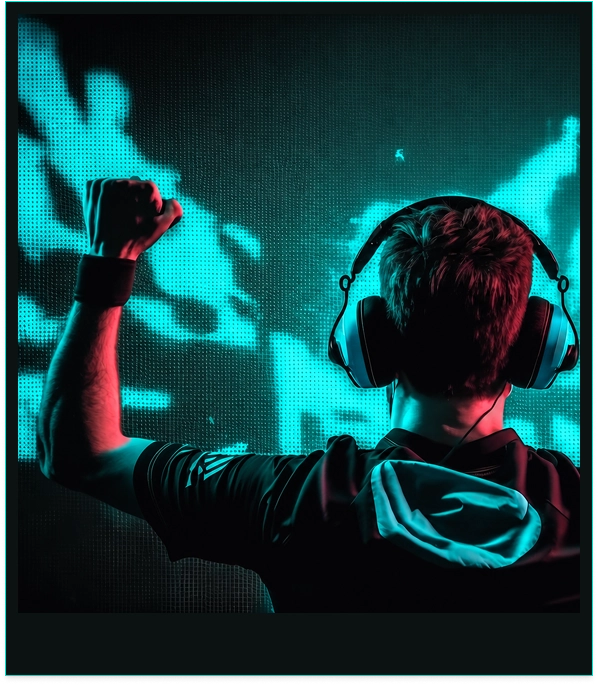 Esports player celebrating at a gaming station inside Fatribak in Wellington